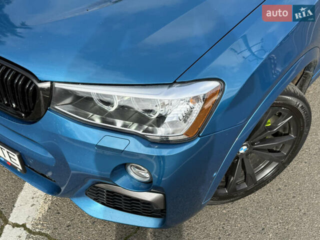 Синій БМВ Х4, об'ємом двигуна 2.98 л та пробігом 130 тис. км за 28300 $, фото 5 на Automoto.ua