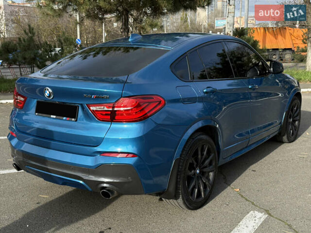 Синій БМВ Х4, об'ємом двигуна 2.98 л та пробігом 130 тис. км за 28300 $, фото 17 на Automoto.ua