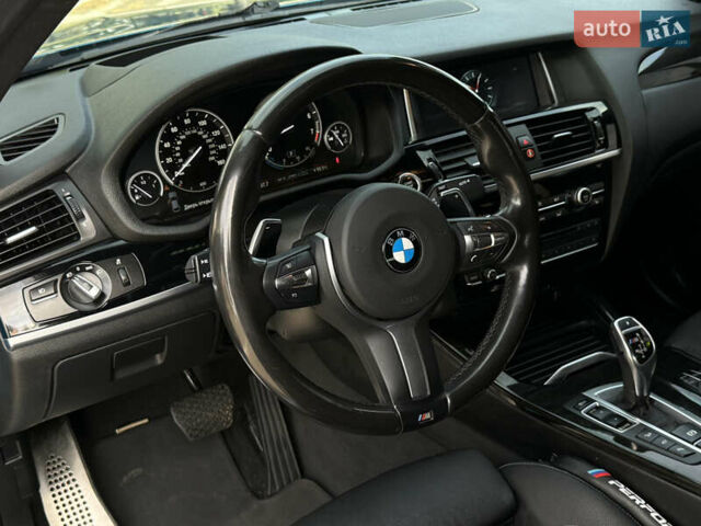 Синій БМВ Х4, об'ємом двигуна 2.98 л та пробігом 130 тис. км за 28300 $, фото 19 на Automoto.ua