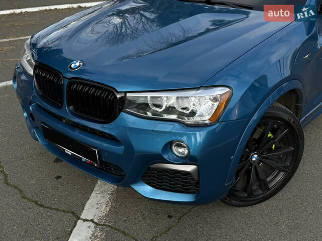 Синій БМВ Х4, об'ємом двигуна 2.98 л та пробігом 130 тис. км за 28300 $, фото 2 на Automoto.ua