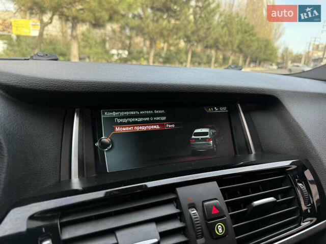Синій БМВ Х4, об'ємом двигуна 2.98 л та пробігом 130 тис. км за 28300 $, фото 60 на Automoto.ua