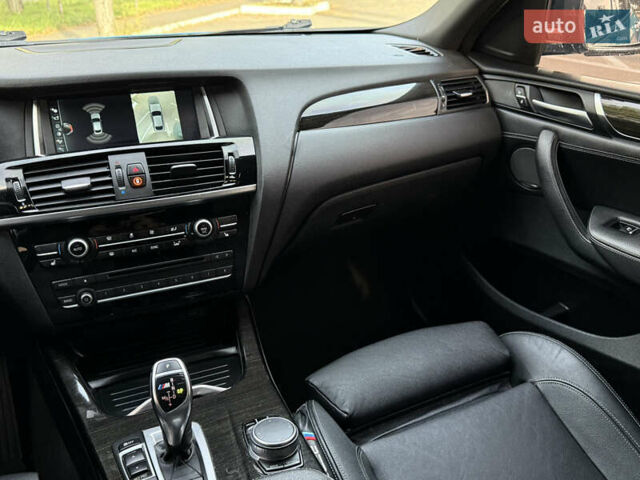 Синій БМВ Х4, об'ємом двигуна 2.98 л та пробігом 130 тис. км за 28300 $, фото 50 на Automoto.ua