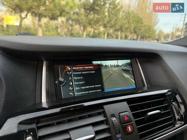 Синій БМВ Х4, об'ємом двигуна 2.98 л та пробігом 130 тис. км за 28300 $, фото 42 на Automoto.ua