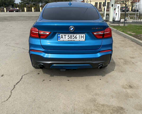 Синий БМВ Х4, объемом двигателя 2.98 л и пробегом 105 тыс. км за 25000 $, фото 6 на Automoto.ua