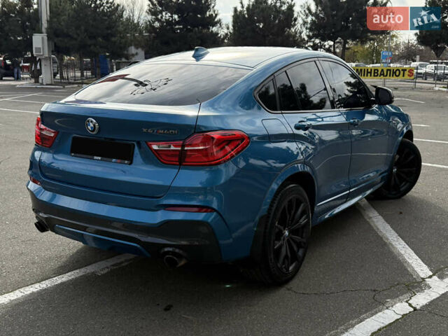 Синій БМВ Х4, об'ємом двигуна 2.98 л та пробігом 130 тис. км за 28300 $, фото 9 на Automoto.ua
