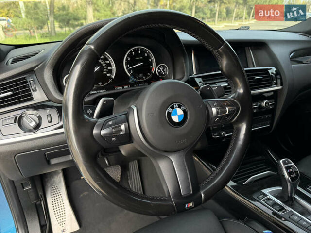 Синій БМВ Х4, об'ємом двигуна 2.98 л та пробігом 130 тис. км за 28300 $, фото 29 на Automoto.ua