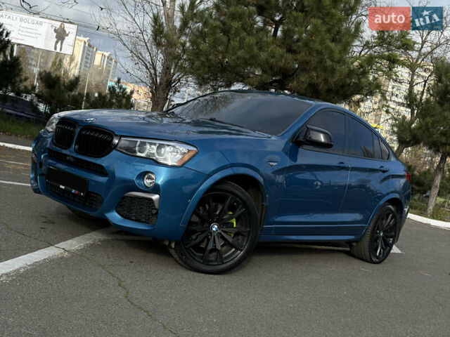 Синій БМВ Х4, об'ємом двигуна 2.98 л та пробігом 130 тис. км за 28300 $, фото 1 на Automoto.ua