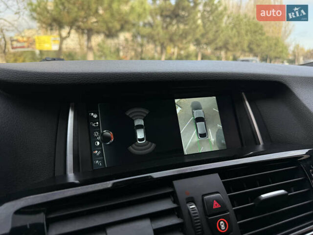 Синій БМВ Х4, об'ємом двигуна 2.98 л та пробігом 130 тис. км за 28300 $, фото 43 на Automoto.ua