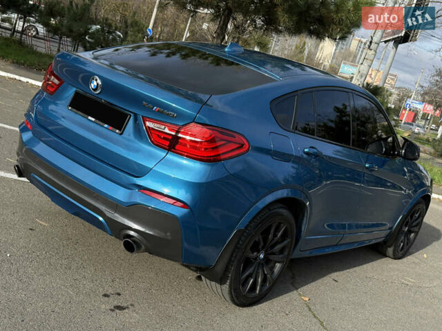 Синій БМВ Х4, об'ємом двигуна 2.98 л та пробігом 130 тис. км за 28300 $, фото 18 на Automoto.ua