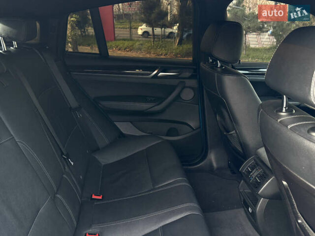 Синій БМВ Х4, об'ємом двигуна 2.98 л та пробігом 130 тис. км за 28300 $, фото 55 на Automoto.ua