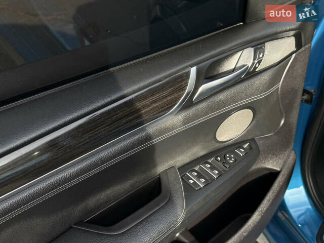 Синій БМВ Х4, об'ємом двигуна 2.98 л та пробігом 130 тис. км за 28300 $, фото 21 на Automoto.ua
