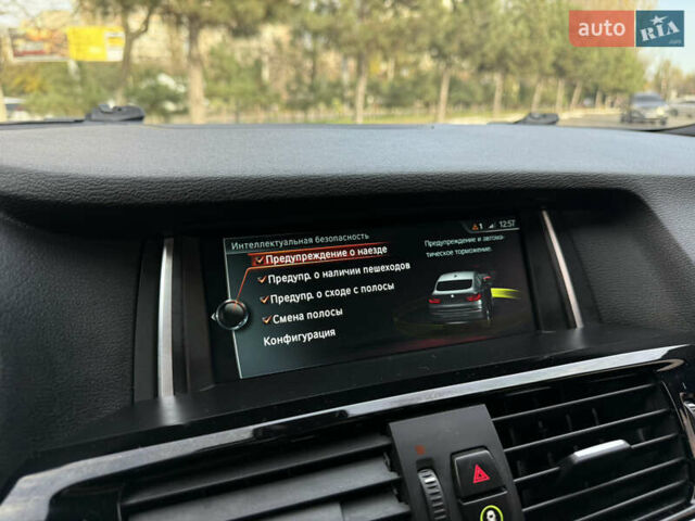 Синій БМВ Х4, об'ємом двигуна 2.98 л та пробігом 130 тис. км за 28300 $, фото 59 на Automoto.ua