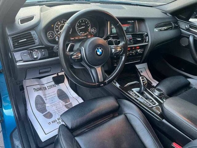 Синий БМВ Х4, объемом двигателя 3 л и пробегом 43 тыс. км за 8300 $, фото 10 на Automoto.ua