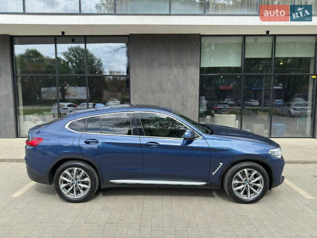 Синий БМВ Х4, объемом двигателя 2 л и пробегом 130 тыс. км за 38100 $, фото 2 на Automoto.ua
