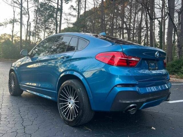 Синий БМВ Х4, объемом двигателя 3 л и пробегом 43 тыс. км за 8300 $, фото 2 на Automoto.ua