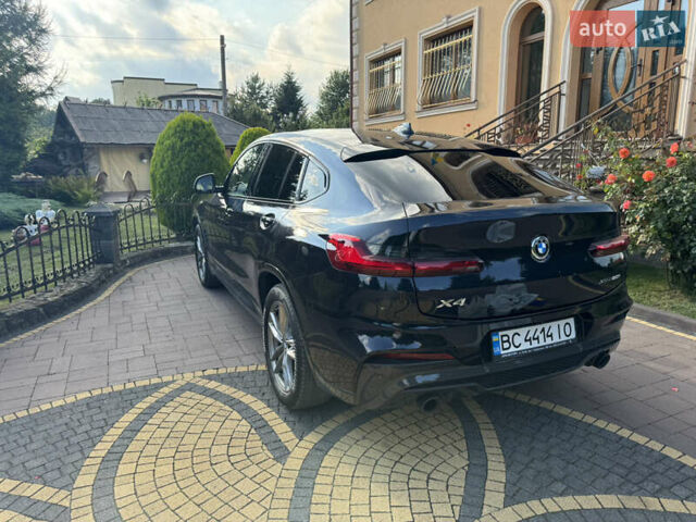 Синий БМВ Х4, объемом двигателя 2 л и пробегом 80 тыс. км за 47300 $, фото 2 на Automoto.ua