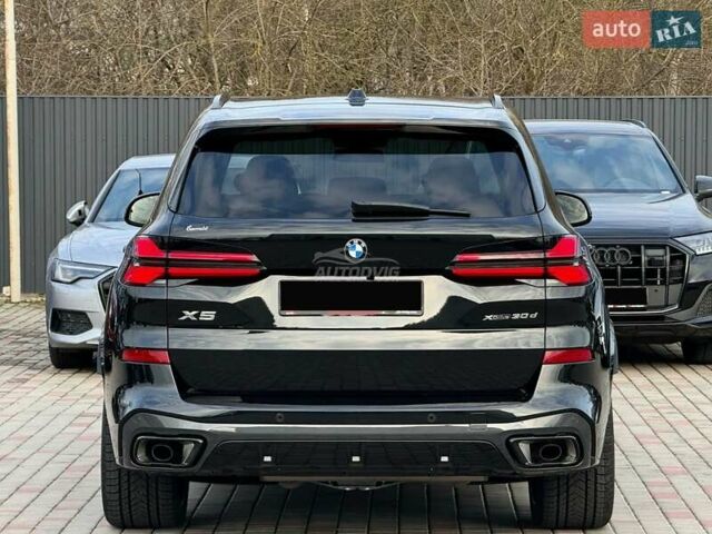 Черный БМВ Х5 М, объемом двигателя 3 л и пробегом 14 тыс. км за 114999 $, фото 4 на Automoto.ua