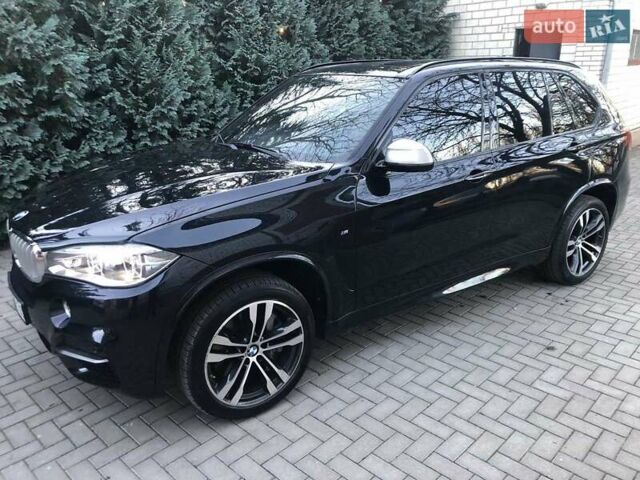 Синий БМВ Х5 М, объемом двигателя 3 л и пробегом 163 тыс. км за 39900 $, фото 3 на Automoto.ua