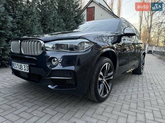 Синий БМВ Х5 М, объемом двигателя 3 л и пробегом 163 тыс. км за 39900 $, фото 1 на Automoto.ua