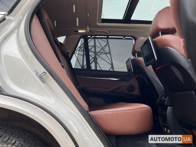 Білий БМВ Х5, об'ємом двигуна 3 л та пробігом 235 тис. км за 23700 $, фото 27 на Automoto.ua
