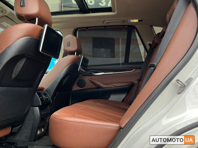 Білий БМВ Х5, об'ємом двигуна 3 л та пробігом 235 тис. км за 23700 $, фото 25 на Automoto.ua