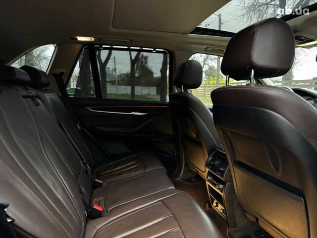 Белый БМВ Х5, объемом двигателя 3 л и пробегом 241 тыс. км за 18440 $, фото 29 на Automoto.ua