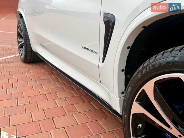 Белый БМВ Х5, объемом двигателя 2.99 л и пробегом 175 тыс. км за 31900 $, фото 45 на Automoto.ua