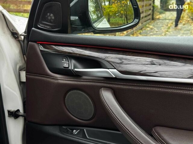 Белый БМВ Х5, объемом двигателя 3 л и пробегом 241 тыс. км за 18440 $, фото 37 на Automoto.ua