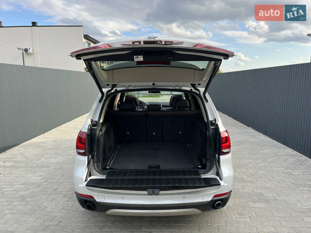 Белый БМВ Х5, объемом двигателя 3 л и пробегом 302 тыс. км за 18300 $, фото 16 на Automoto.ua