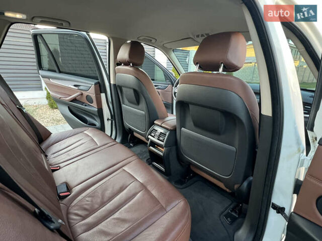 Белый БМВ Х5, объемом двигателя 2 л и пробегом 169 тыс. км за 23800 $, фото 82 на Automoto.ua