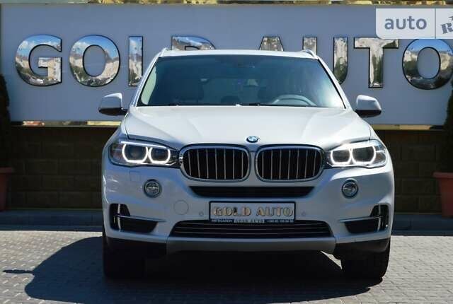 Белый БМВ Х5, объемом двигателя 3 л и пробегом 175 тыс. км за 21900 $, фото 2 на Automoto.ua