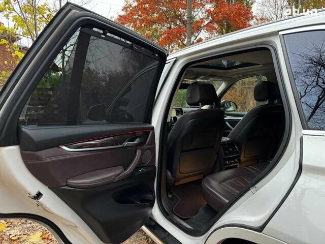 Белый БМВ Х5, объемом двигателя 3 л и пробегом 241 тыс. км за 18440 $, фото 25 на Automoto.ua