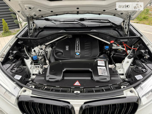 Білий БМВ Х5, об'ємом двигуна 2.99 л та пробігом 185 тис. км за 35000 $, фото 34 на Automoto.ua