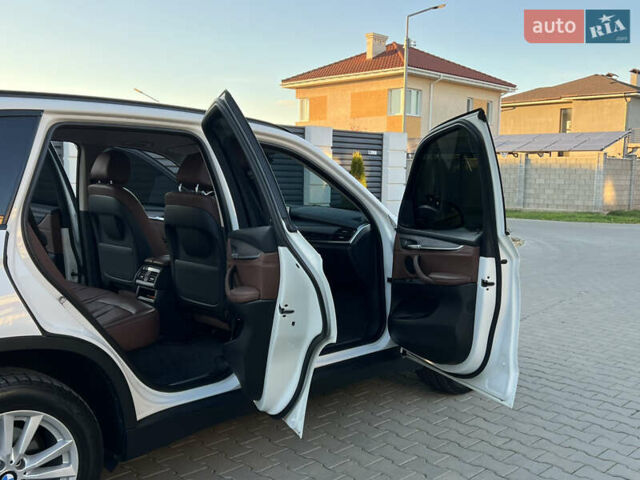 Белый БМВ Х5, объемом двигателя 2 л и пробегом 169 тыс. км за 23800 $, фото 81 на Automoto.ua