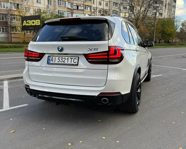 Белый БМВ Х5, объемом двигателя 2.99 л и пробегом 142 тыс. км за 34377 $, фото 4 на Automoto.ua