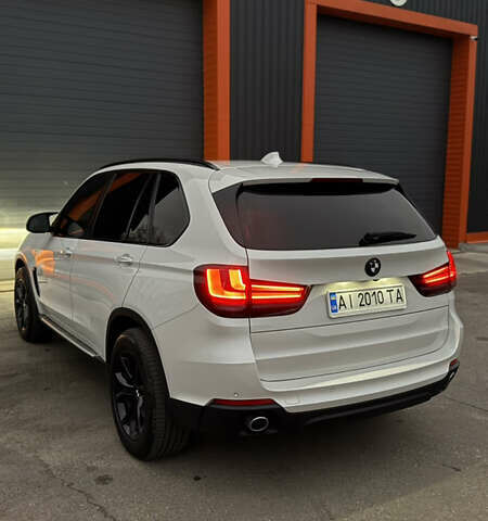 Белый БМВ Х5, объемом двигателя 3 л и пробегом 225 тыс. км за 28999 $, фото 4 на Automoto.ua