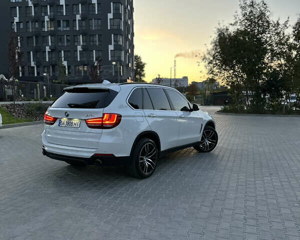 Білий БМВ Х5, об'ємом двигуна 3 л та пробігом 140 тис. км за 21500 $, фото 6 на Automoto.ua