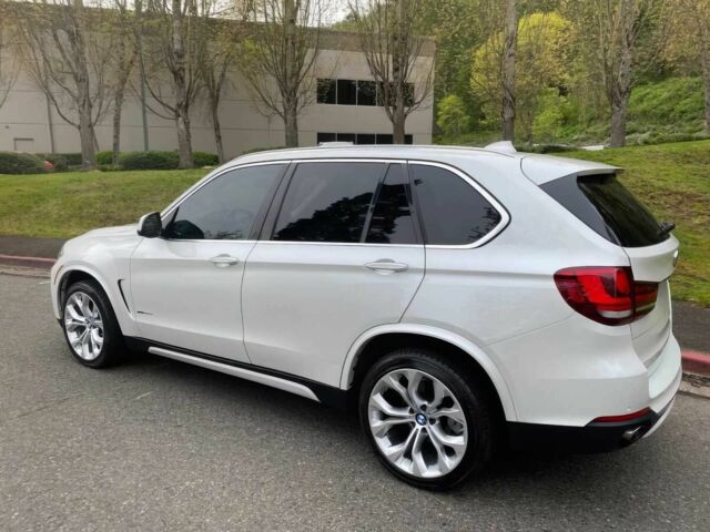 Белый БМВ Х5, объемом двигателя 3 л и пробегом 70 тыс. км за 22600 $, фото 2 на Automoto.ua