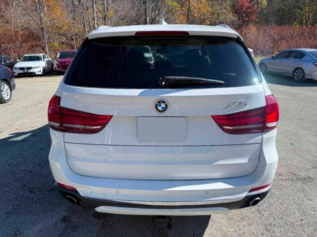 Белый БМВ Х5, объемом двигателя 3 л и пробегом 75 тыс. км за 14000 $, фото 5 на Automoto.ua