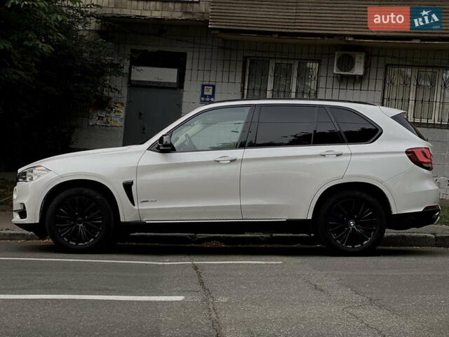 Білий БМВ Х5, об'ємом двигуна 3 л та пробігом 65 тис. км за 23800 $, фото 9 на Automoto.ua