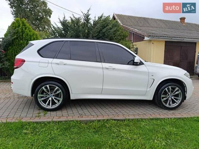 Білий БМВ Х5, об'ємом двигуна 2 л та пробігом 170 тис. км за 28900 $, фото 13 на Automoto.ua
