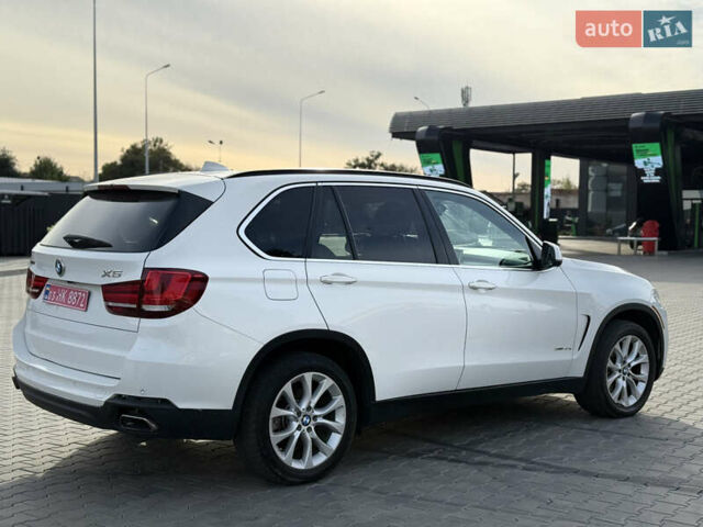 Білий БМВ Х5, об'ємом двигуна 2 л та пробігом 230 тис. км за 18500 $, фото 10 на Automoto.ua