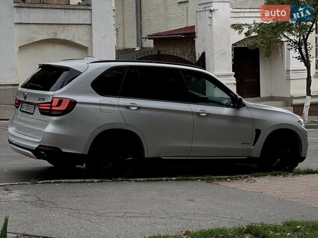 Білий БМВ Х5, об'ємом двигуна 3 л та пробігом 65 тис. км за 23800 $, фото 4 на Automoto.ua