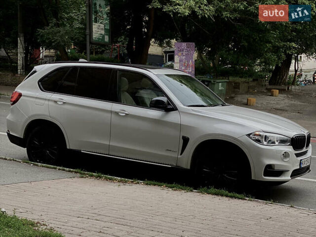 Білий БМВ Х5, об'ємом двигуна 3 л та пробігом 65 тис. км за 23800 $, фото 2 на Automoto.ua