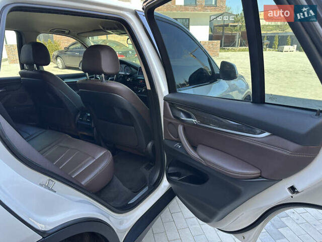 Белый БМВ Х5, объемом двигателя 2 л и пробегом 225 тыс. км за 25300 $, фото 47 на Automoto.ua