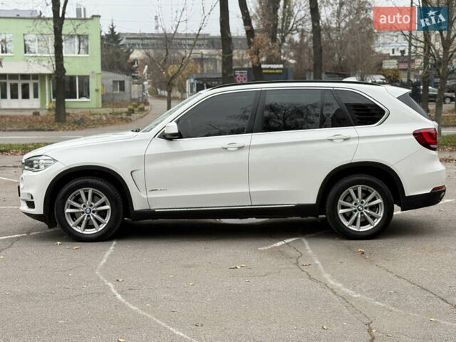 Білий БМВ Х5, об'ємом двигуна 2 л та пробігом 130 тис. км за 29500 $, фото 11 на Automoto.ua