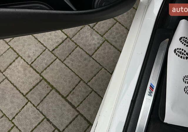 Білий БМВ Х5, об'ємом двигуна 2 л та пробігом 166 тис. км за 28000 $, фото 13 на Automoto.ua