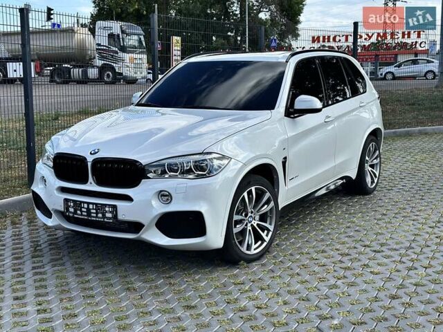 Белый БМВ Х5, объемом двигателя 3 л и пробегом 128 тыс. км за 37500 $, фото 1 на Automoto.ua