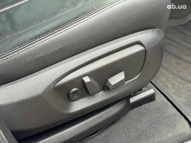 Білий БМВ Х5, об'ємом двигуна 2 л та пробігом 95 тис. км за 29990 $, фото 27 на Automoto.ua