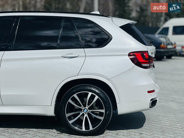 Білий БМВ Х5, об'ємом двигуна 2 л та пробігом 155 тис. км за 30999 $, фото 12 на Automoto.ua